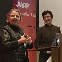 Nancy Hanrahan and Bonnie Clipper standing at the podium