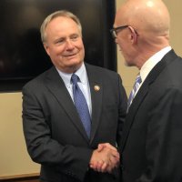 Congressman David Joyce (OH), co-chair of the House nursing caucus, left, greets RWJF’s Paul Kuehnert
